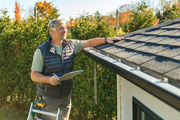 Professional Storm Damage Roof Repair technician working in Viola, DE